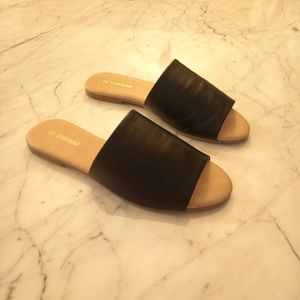 Black slip-on sandals
